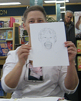 Beth with her drawing of Aunt Pru. She had to enlarge the mouth several times to get the effect she wanted.
