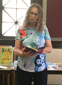 Linda reading from Run